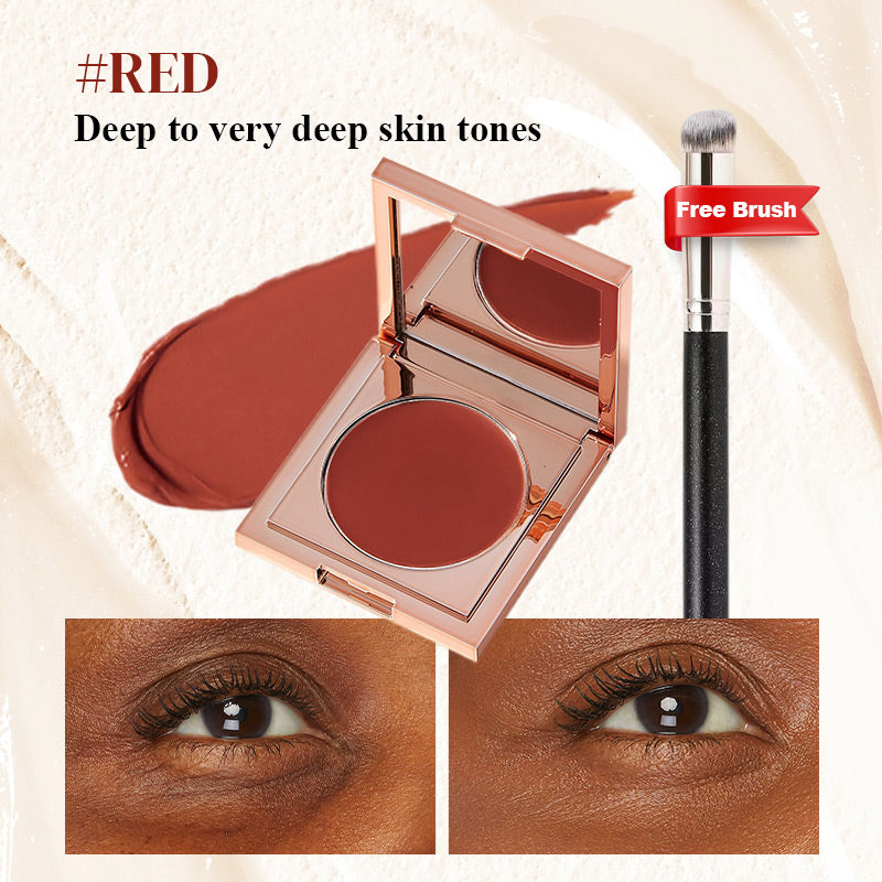 Red under-eye corrector for deep skin tones