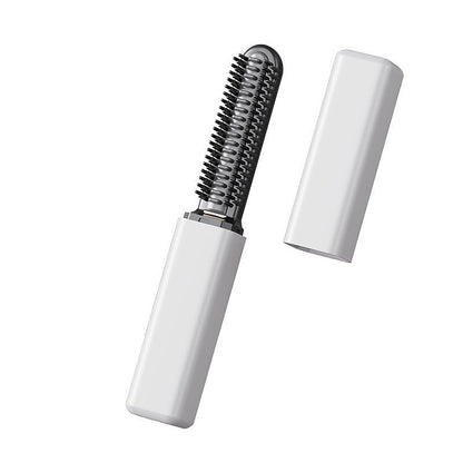 Portable heated bang styling comb in pearl white and rose gold